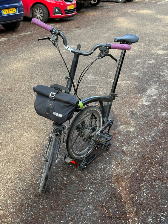 A folded Brompton bike