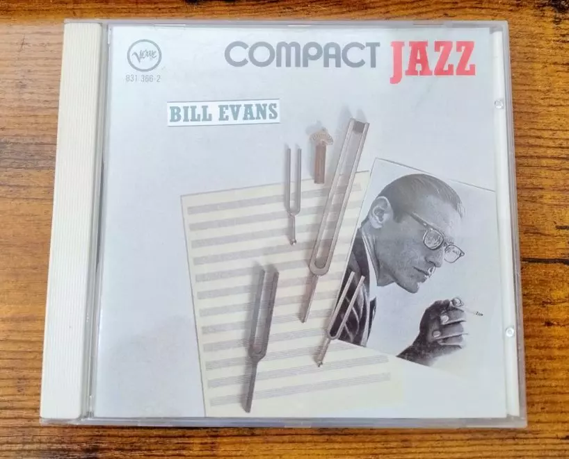 Compact Jazz - Bill Evans. Cover features some clip-arty style stuff and some dude who looks like a 1950s watch model.