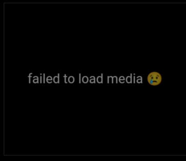 Screenshot of image in post being replied to. Contains text that says "failed to load media" with a sad emoji (😥)