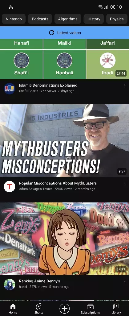 A mobile screenshot of the Youtube home page showing three videos: &quot;Islamic Denominations Explained&quot; by Useful Charts, &quot;Popular Misconceptions About Mythbusters&quot; by Adam Savage&#39;s Tested, and &quot;Ranking Anime Denny&#39;s&quot; by hazel