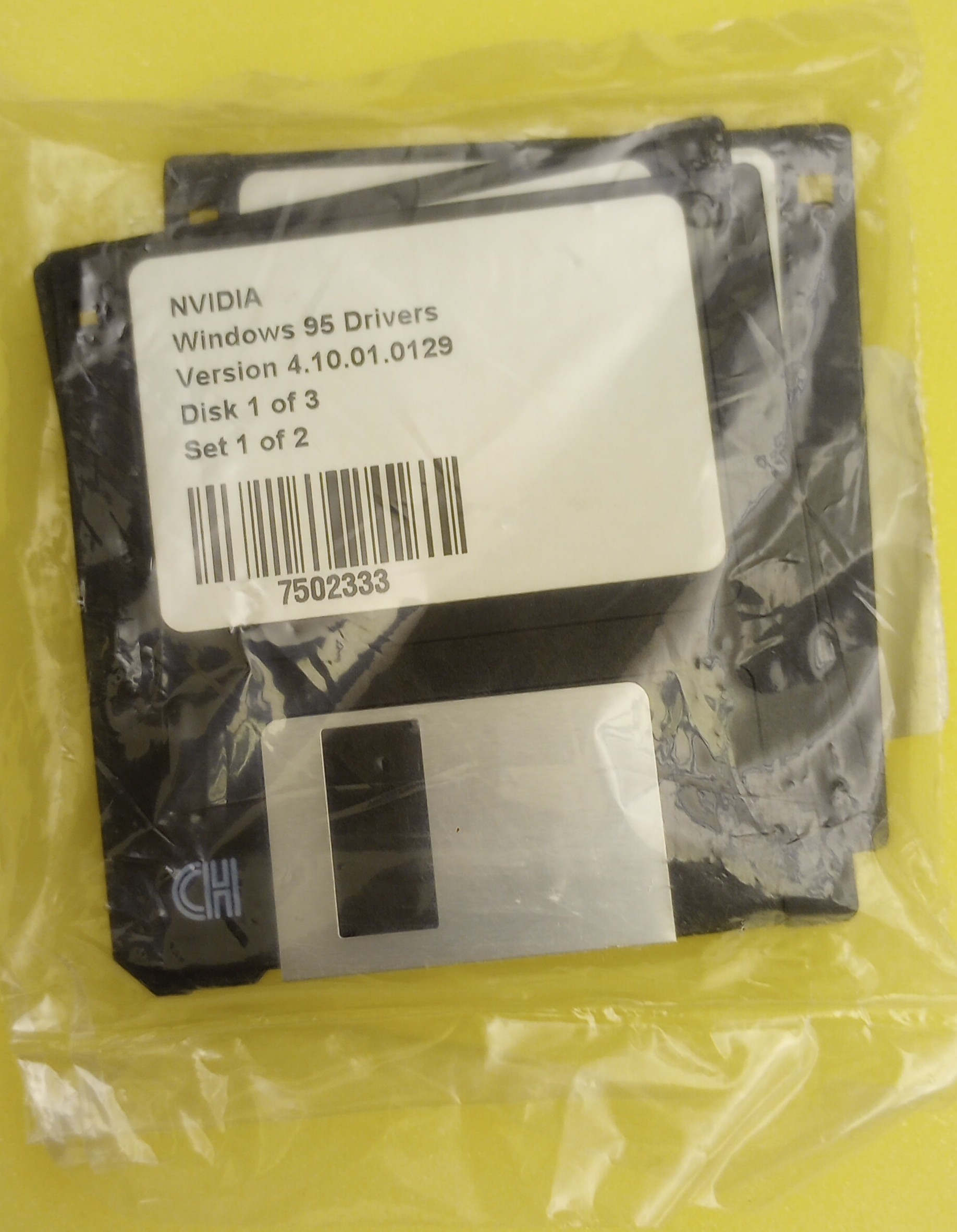 NVIDIA drivers for Windows 95 on 3 floppy disks labeled Set 1 of 2