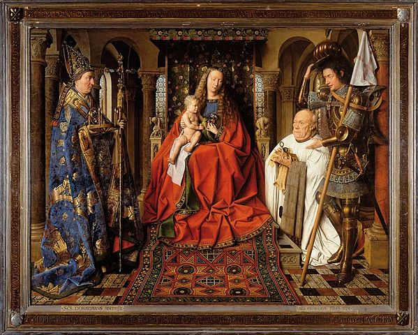 Image description of full painting: huge painting, framed, of the Christian Madonna with baby Jesus in her lap. She is seated on a throne. To her left is a blue-robed religious figure with a bishop hat. To her right is a kneeling white-robed man and a standing armored man. There are tiny statues to her left and right, one of which is the detail image.