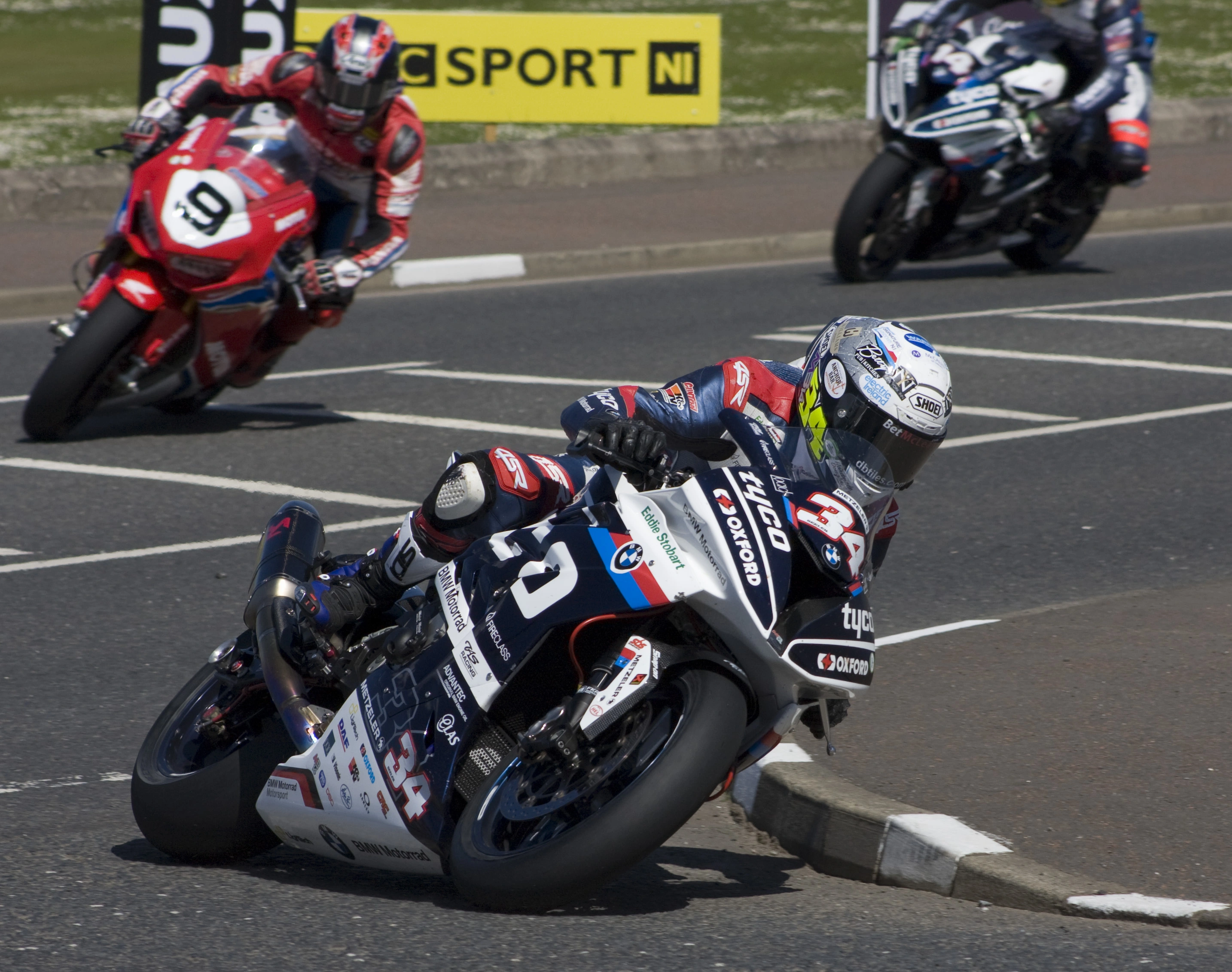 Alistair Sealy in 2018 on a Tyco sponsored BMW Superbike rounds York Corner in the NW200